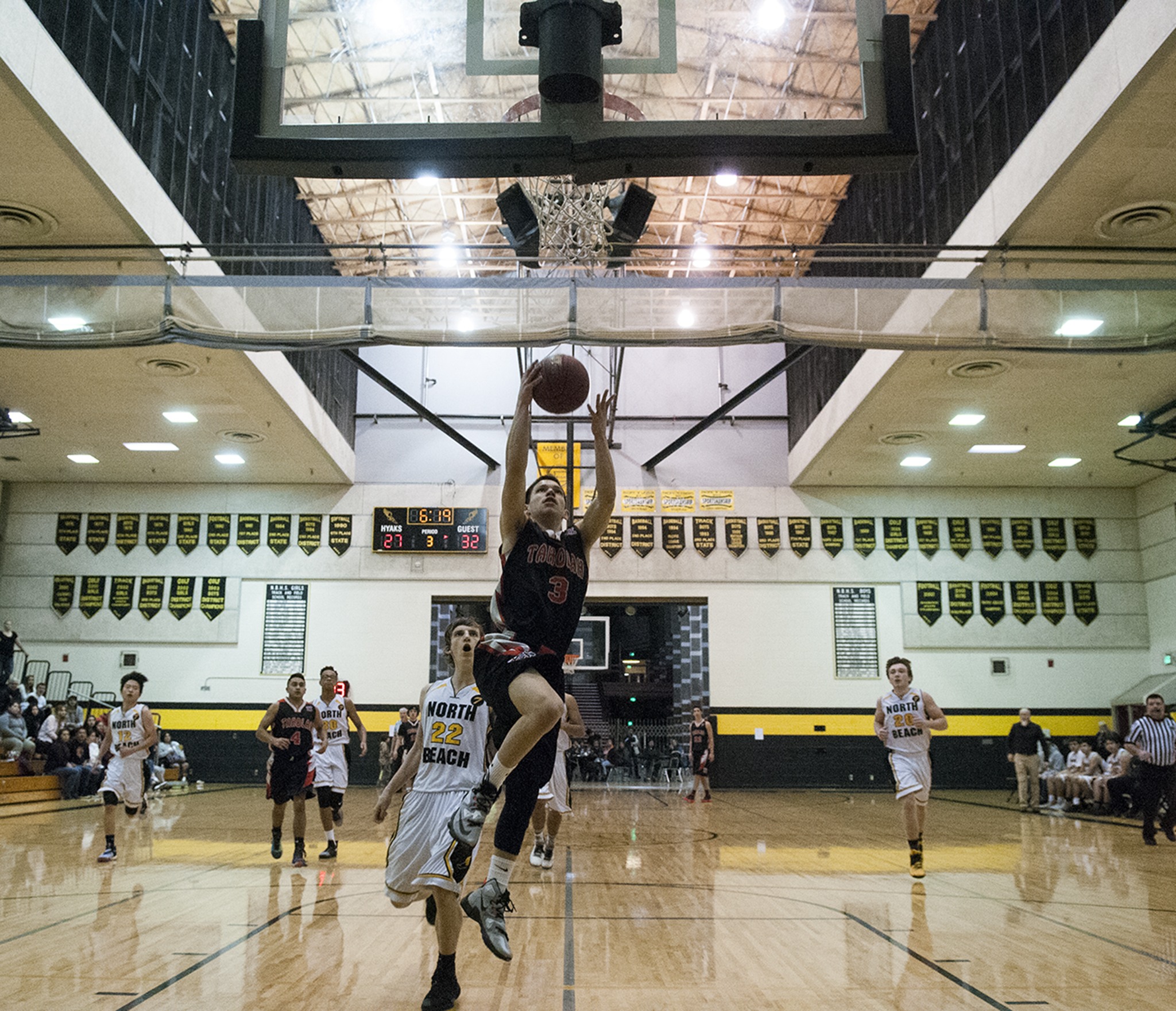 (Brendan Carl | The Daily World) Taholah’s Tom Anderson goes up for a basket after he stole the ball and sprinted away during Thursday’s contest against rival North Beach at the Holiday With The Hyaks tournament in Oyehut. Anderson scored 15 points in the Chitwhins’ 65-43 win over the Hyaks.