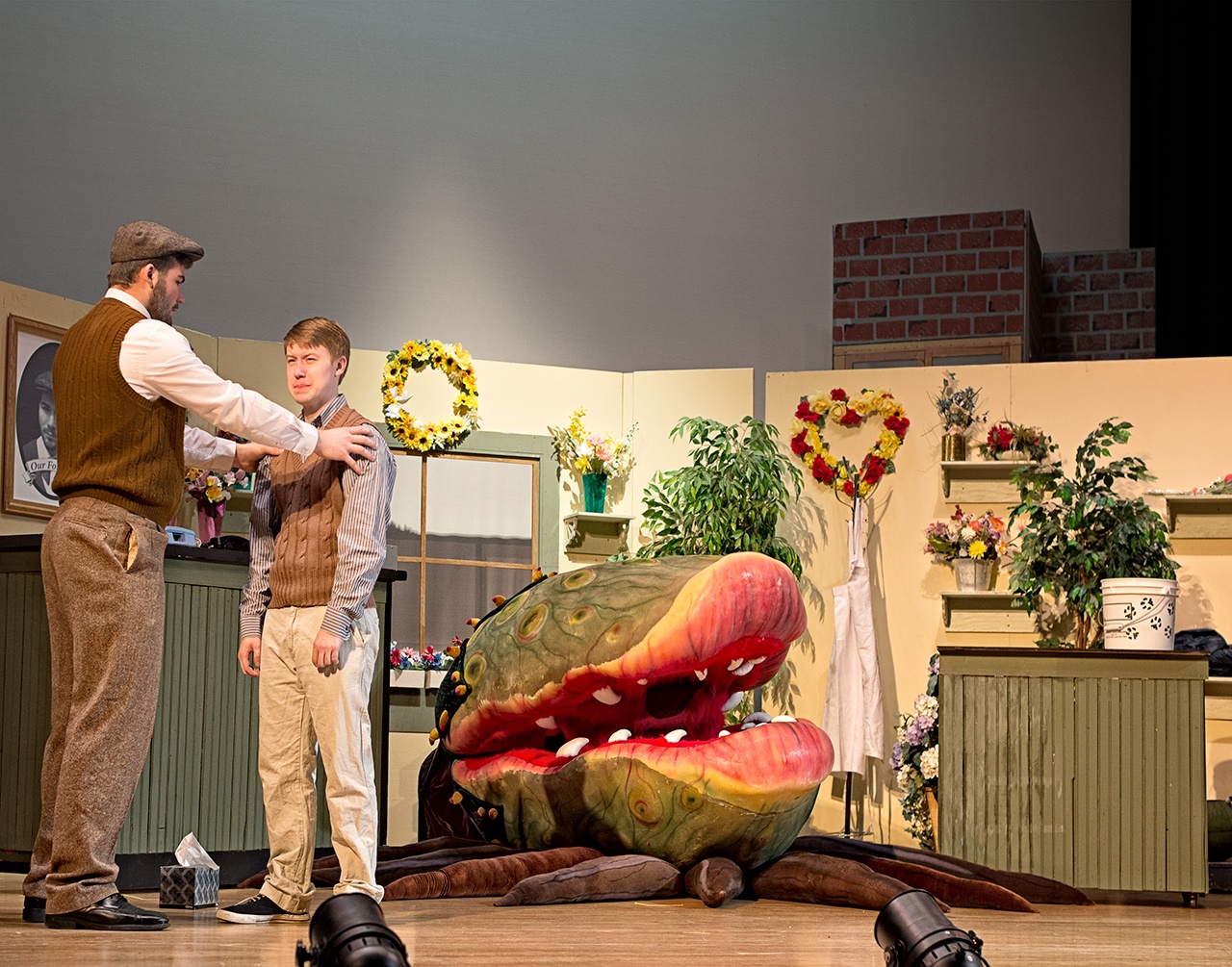 Dylan Moodenbaugh as Mr Mushnik and Wes Hewitt as Seymour in a scene from the Hoquiam High School production of “Little Shop of Horrors.” (Photo by Patricia Jollimore)