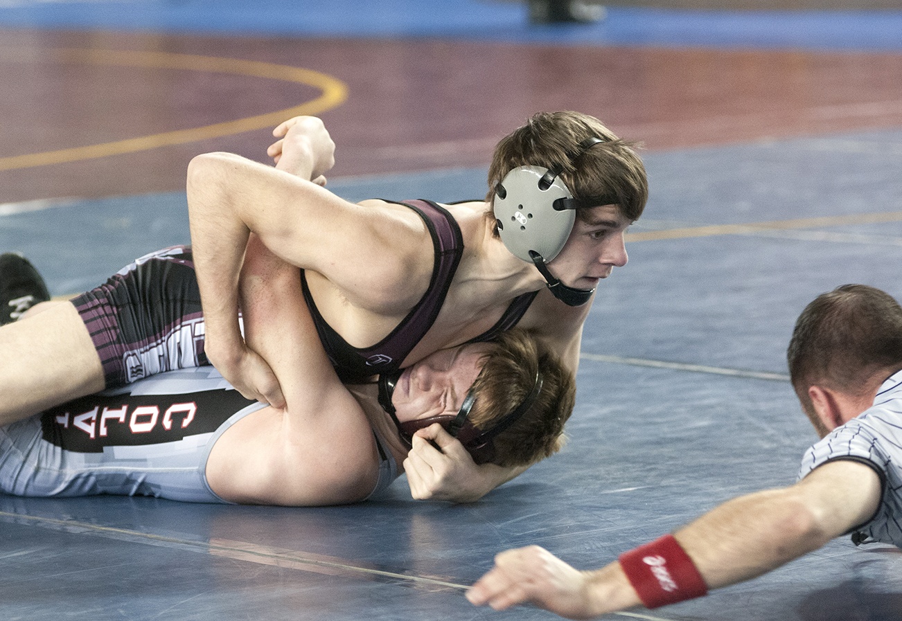 (Brendan Carl | The Daily World) Montesano’s Tony Williams pins Colville’s Tyler Baun during a consolation bracket match on Saturday.