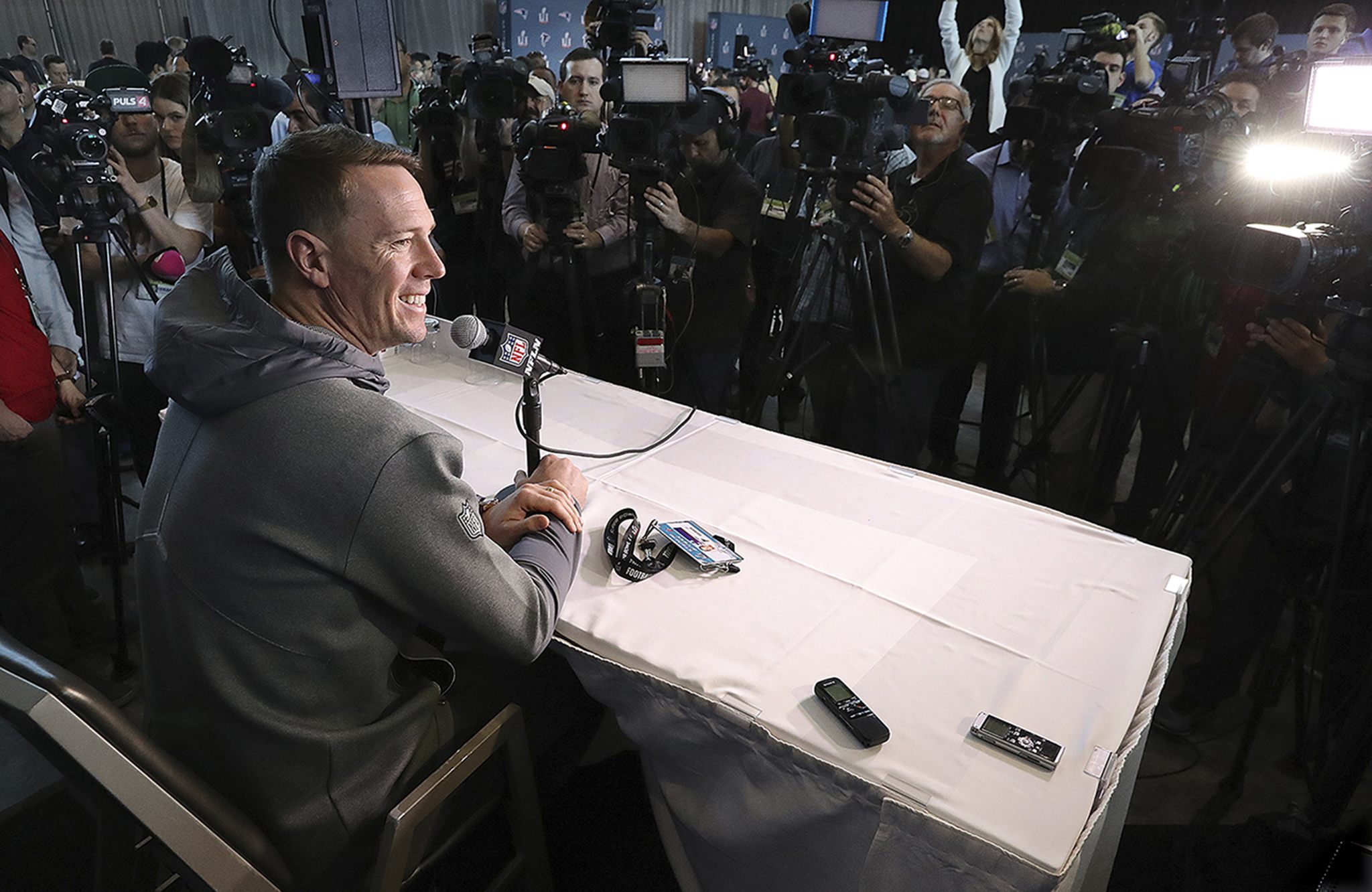 (Curtis Compton/Atlanta Journal-Constitution) Atlanta Falcons quarterback Matt Ryan takes questions during his Super Bowl press conference on Tuesday at Memorial City Mall ice arena in Houston, Texas.