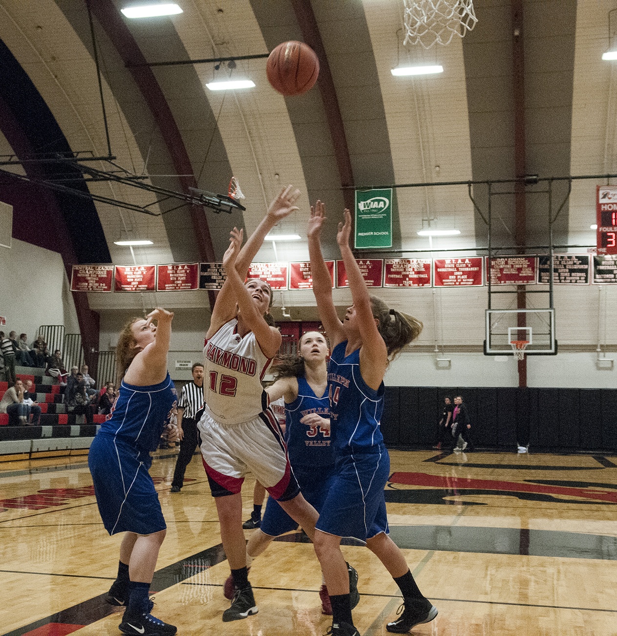 (Brendan Carl | The Daily World) Raymond’s Mikayla Collins puts up a shot in between two Willapa Valley defenders during a Pacific 2B League game in December. The Gulls will take on Ilwaco in a regional seeding game Saturday at Chehalis.