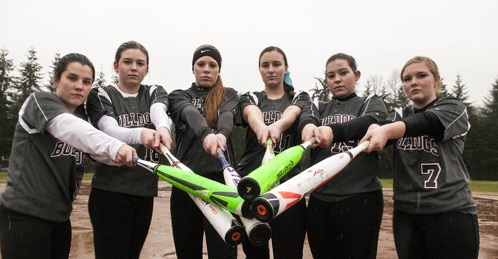 (Brendan Carl | The Daily World) Montesano hitters, left to right, Hannah Quinn, Lindsay Pace, Samantha Stanfield, Annie Cristelli, Allyssa Gustafson and Morgan Kersker, are ready to swing for the fences in 2017. The Bulldogs return all but two starters from a team that finished second at the 1A state tournament in 2016.