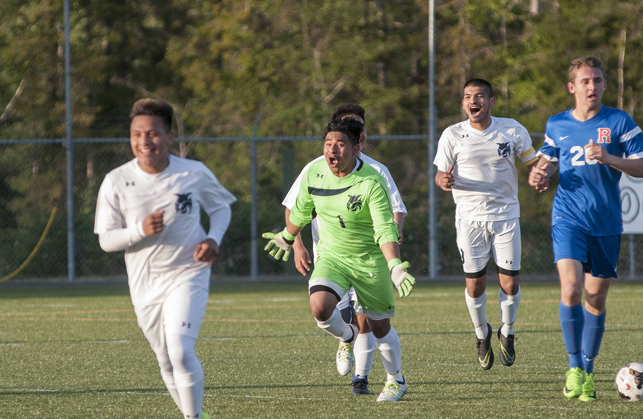 (Brendan Carl | The Daily World) Aberdeen goalkeeper Alexis Garcia-Guzman celebrates after the final whistle sounded against Ridgefield on Tuesday.