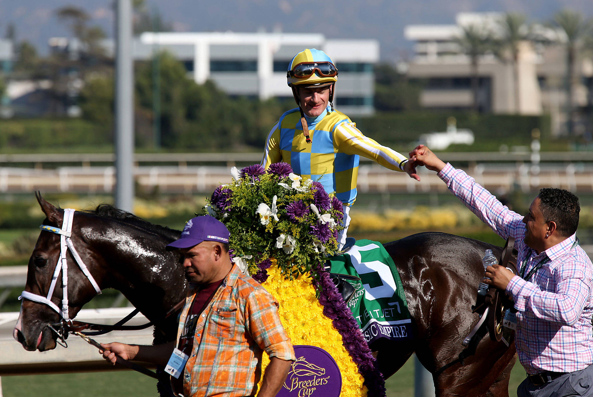 (Luis Sinco | Los Angeles Times) Classic Empire, with jockey Julien Leparouz, are seen here after winning the Breeder’s Cup Sentien Jet Juvenile last November in Santa Anita, Calif. On Wednesday, Classic Empire was named the odds-on favorite to win this Saturday’s Kentucky Derby.