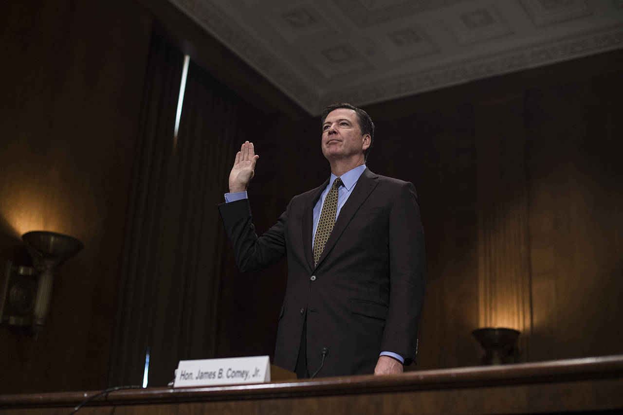 FBI Director James Comey is sworn in during a Senate Judiciary Committee hearing on May 3. He was fired abruptly by President Trump on Tuesday.                                (Tom Williams/Congressional Quarterly)