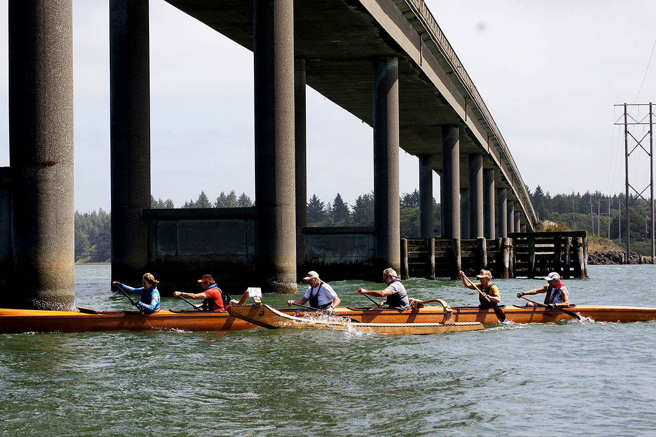 Photo by Jon Harwood                                 Competitors in last year’s Elk River Challenge battle it out under the Elk River Bridge near Brady’s Oysters.