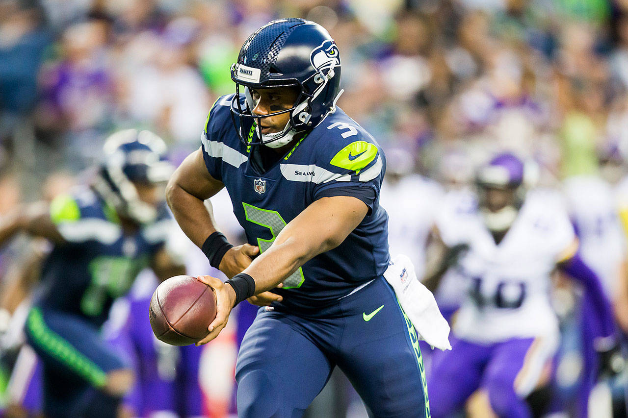 Seattle Seahawks: Russell Wilson Must Run More in Offense