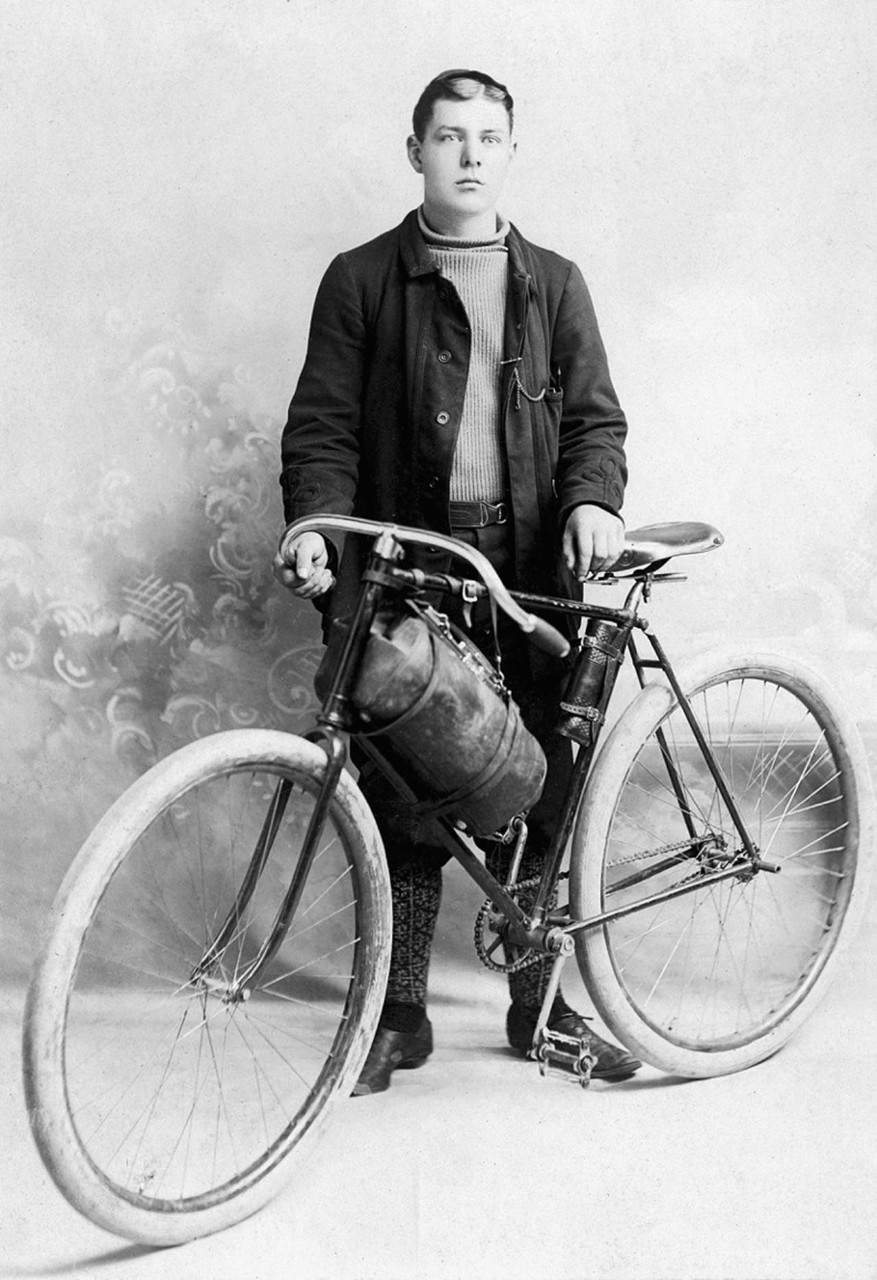 Photo courtesy Pacific County Historical Society                                 L.V. Raymond is pictured as a teenager in 1894 with a different bike from the one on display at the museum.