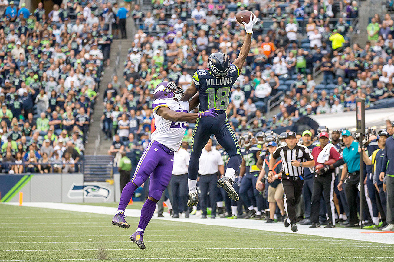 Doug Baldwin's amazing one arm catch in playoff game against the Vikings!  What a season for Doug! January 2016