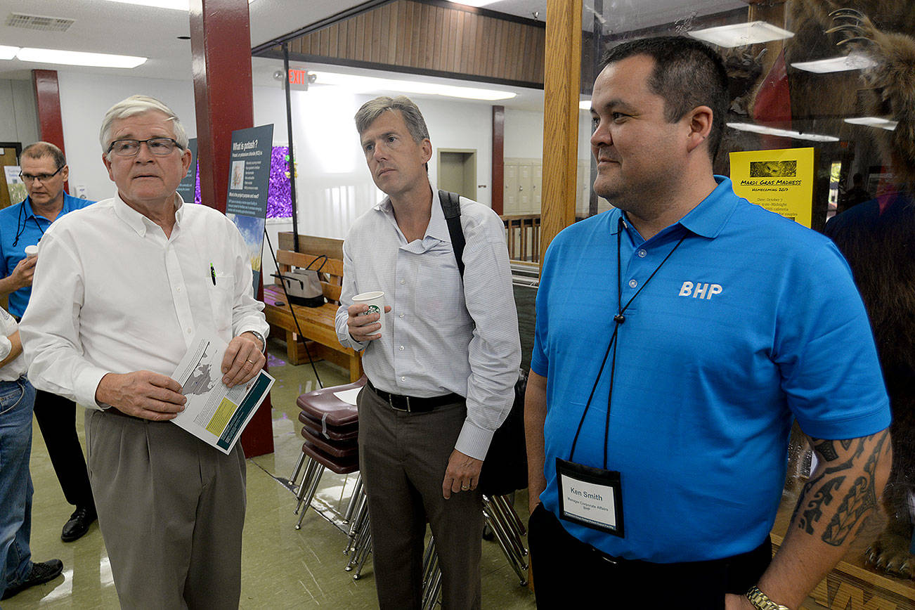 DAN HAMMOCK | THE DAILY WORLD                                Sen. Dean Takko (D-Longview), Hoquiam City Administrator Brian Shay and BHP’s Manager of Corporate Affairs Ken Smith chat before the BHP open house Thursday at Hoquiam High School. About 100 people attended and were filled in about the company’s proposed potash storage and shipping facility at the Port of Grays Harbor.