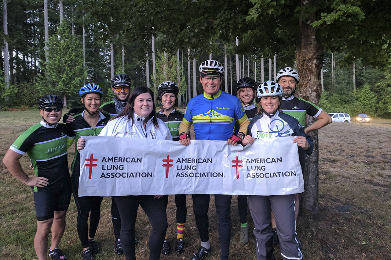 Gov. Jay Inslee (center, blue shirt) led Team Inslee on the full 100-mile ride from Lacey to Westport on Saturday for the inaugural Reach the Beach Washington event. (Courtesy photo)