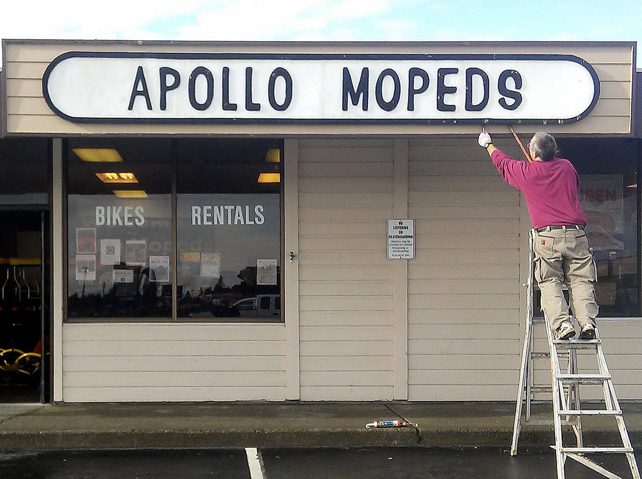 Julie Merrill photo: The Apollo Moped sigh is taken down earlier this week.