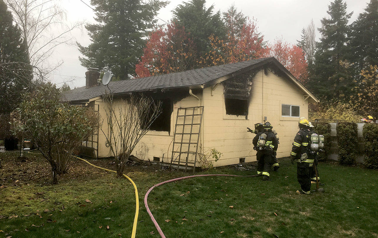 FIRE DISTRICT 5 PHOTO                                A single story home was damage and a resident injured in a house fire in the 1000 block of West Martin Street in Elma Wednesday morning.