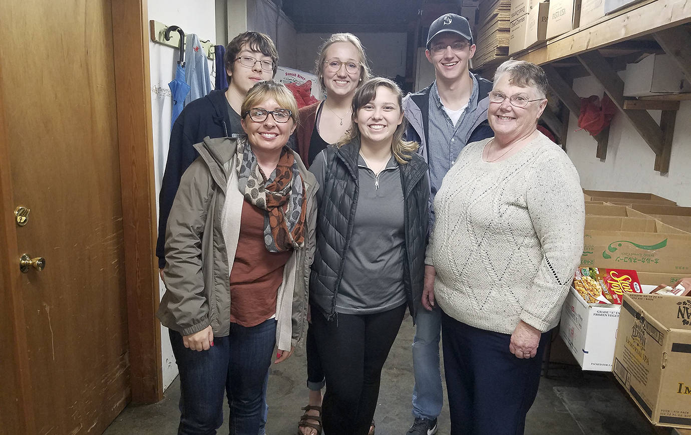 Aberdeen High School students dropped off a check from their 2017 Food Ball take at the Aberdeen food bank just prior to Thanksgiving break. Pictured from left are AHS freshman Jordan Braegelmann, ASB adviser Ashley Kohlmeier, AHS seniors Holland Bergeson, Nadia Wirta and Brendan King, and Kay Bumstead of the food bank.