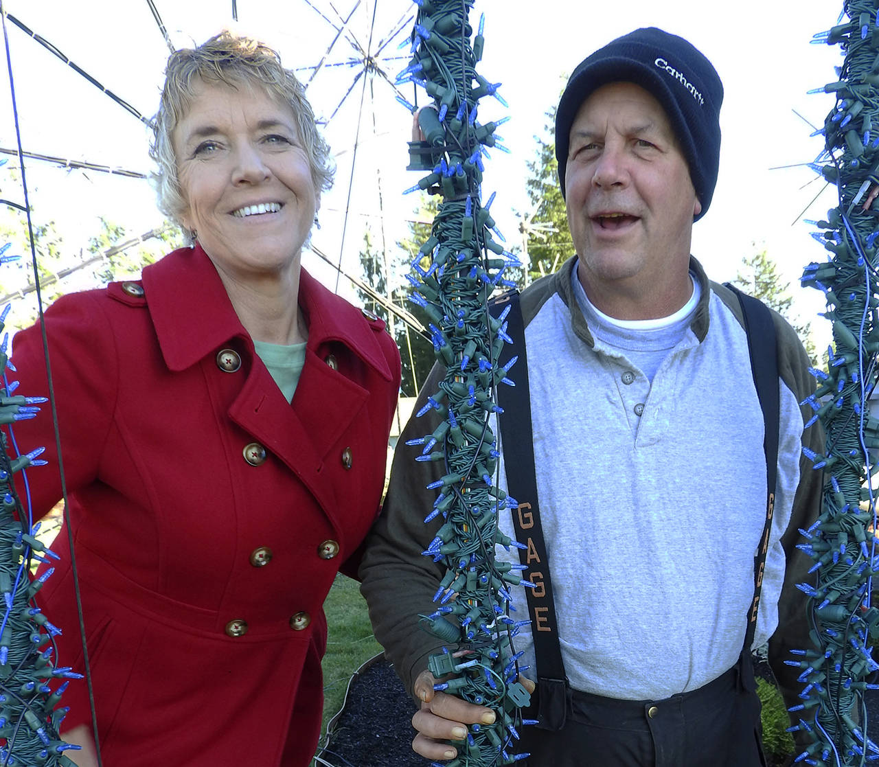 Photos by Kat Bryant | The Daily World                                 Ken and Tanya Collins are hanging it up after 12 years hosting their JingleLights show, which comprises more than 200,000 individual lights and takes up their entire yard and part of their neighbor’s.