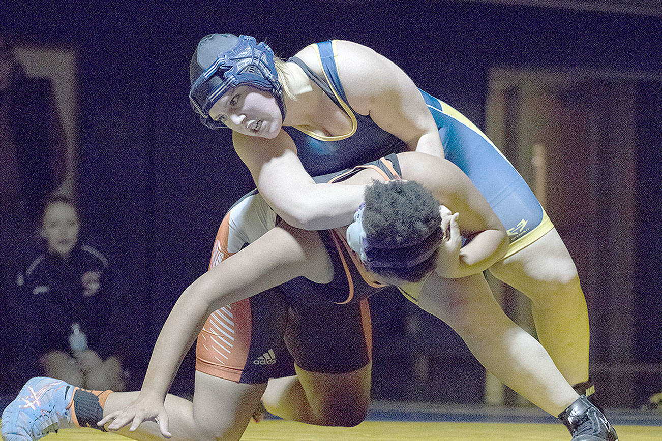 Bobcat boys, girls notch sweep in wrestling