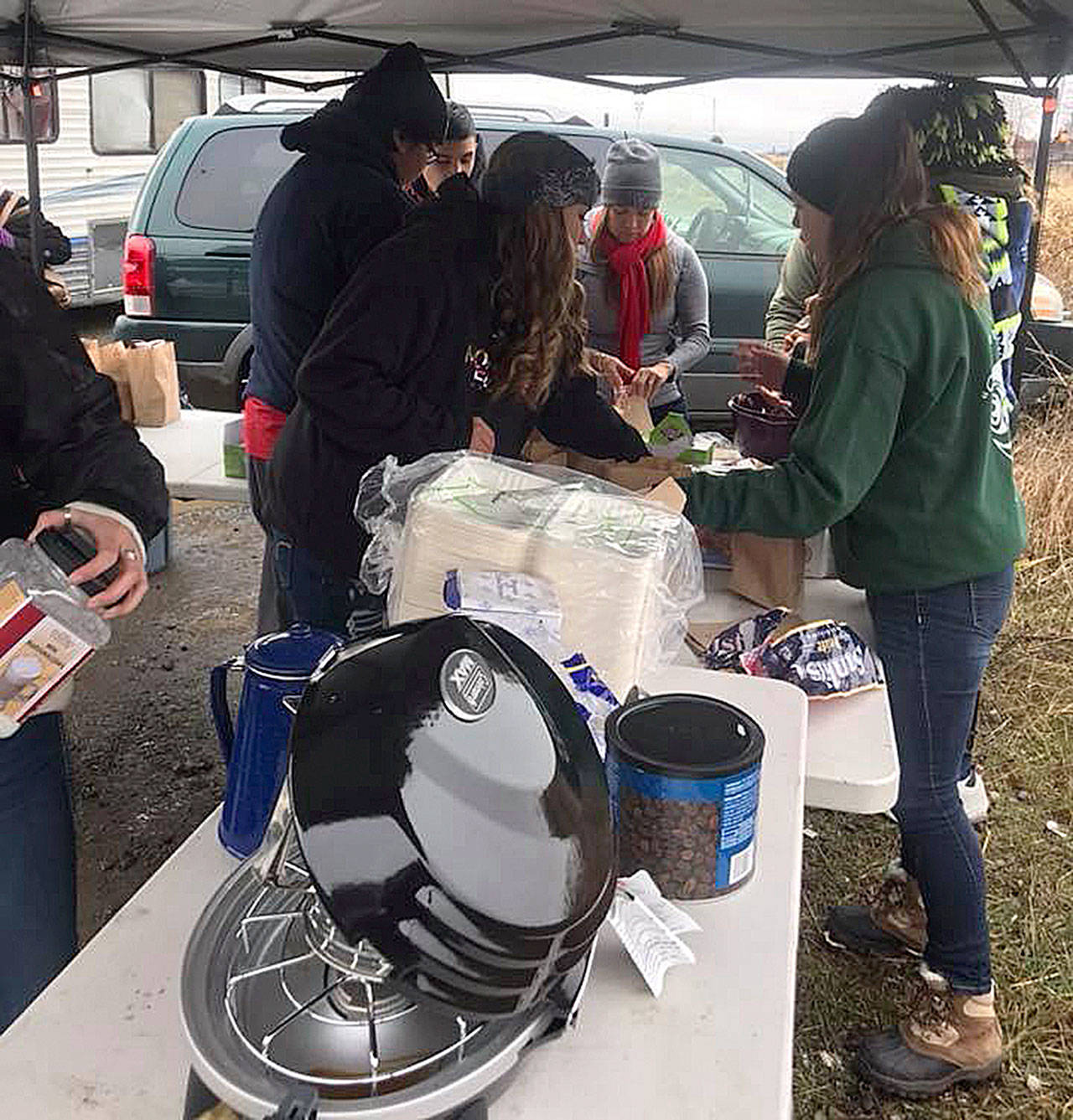 Quinault members serve food to homeless camps on Christmas