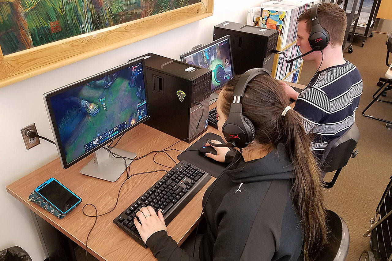 (Courtesy Ralph Hogaboom) Kass Lopez, president of the Grays Harbor Esports Club, plays League of Legends, along with Malachi Richards. The club’s tournament will be this Saturday at 7 p.m. at the college.