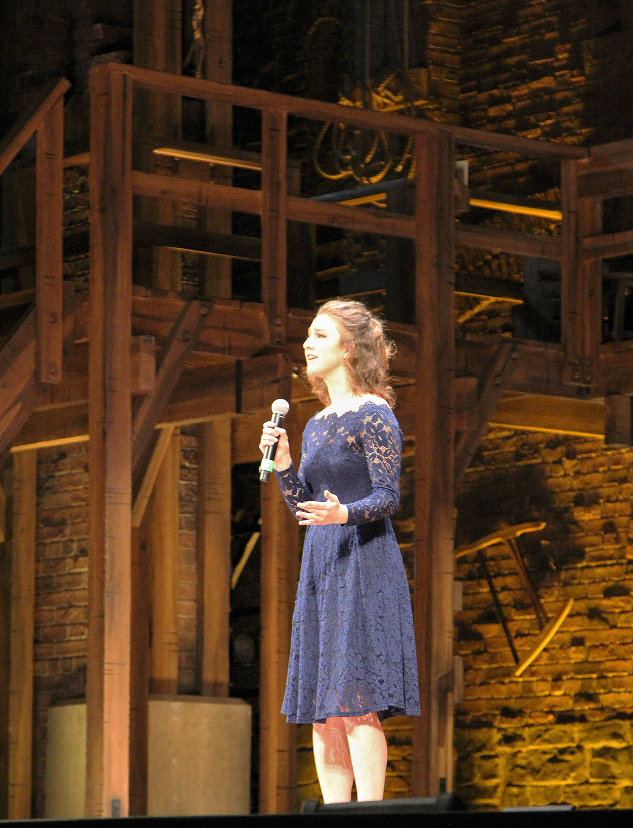 (Courtesy Kariana Aldrich) North River School sophomore Georgia Clark sings “A letter from Aaron Burr to Alexander Hamilton” at the Paramount Theatre in Seattle.