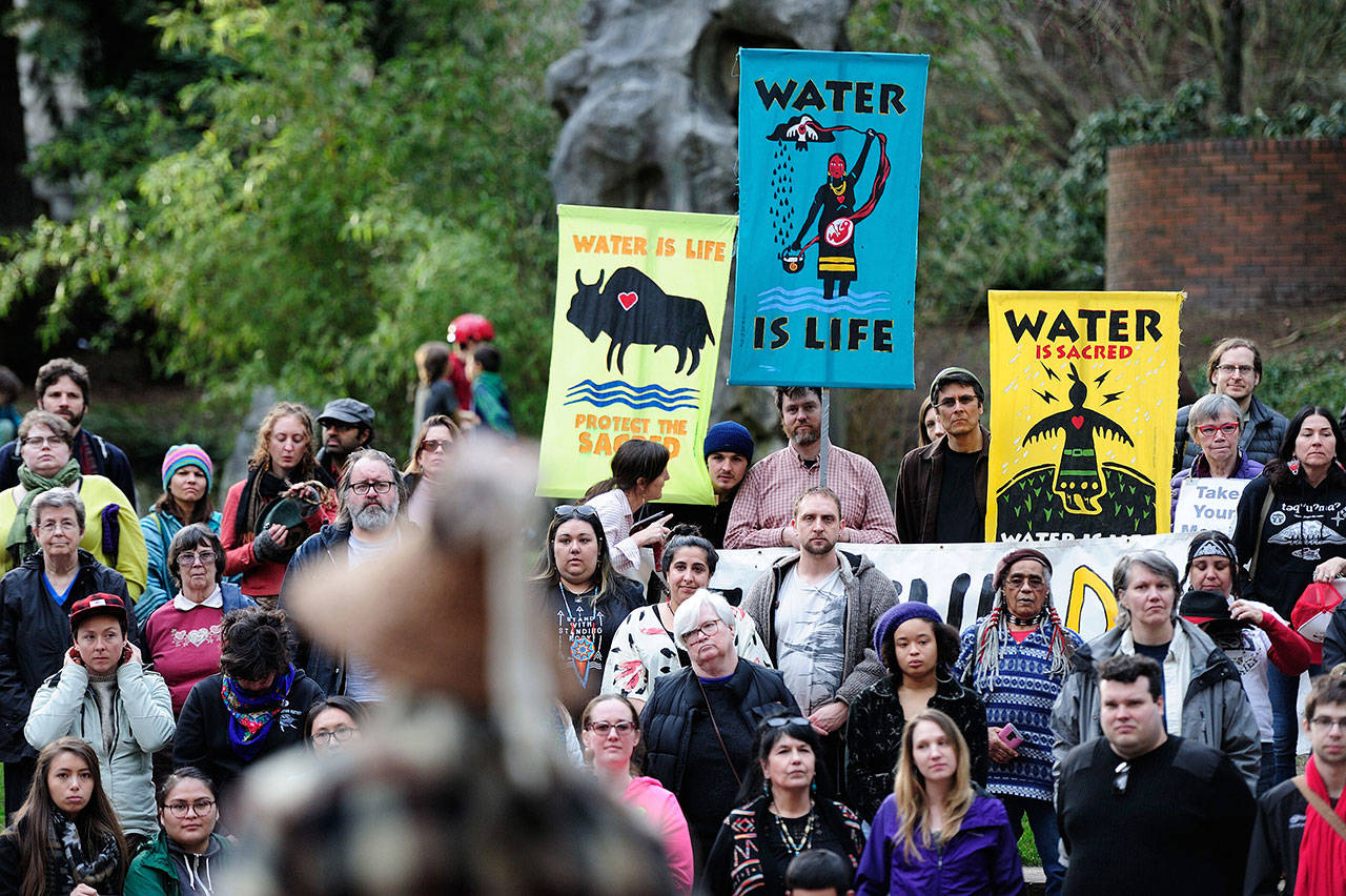 Protesters stand in solidarity with the “Native Nations Rise” march on Washington, D.C. against the construction of the Dakota Access Pipeline in Portland, Ore., on March 10, 2017. (Alex Milan Tracy/TNS)