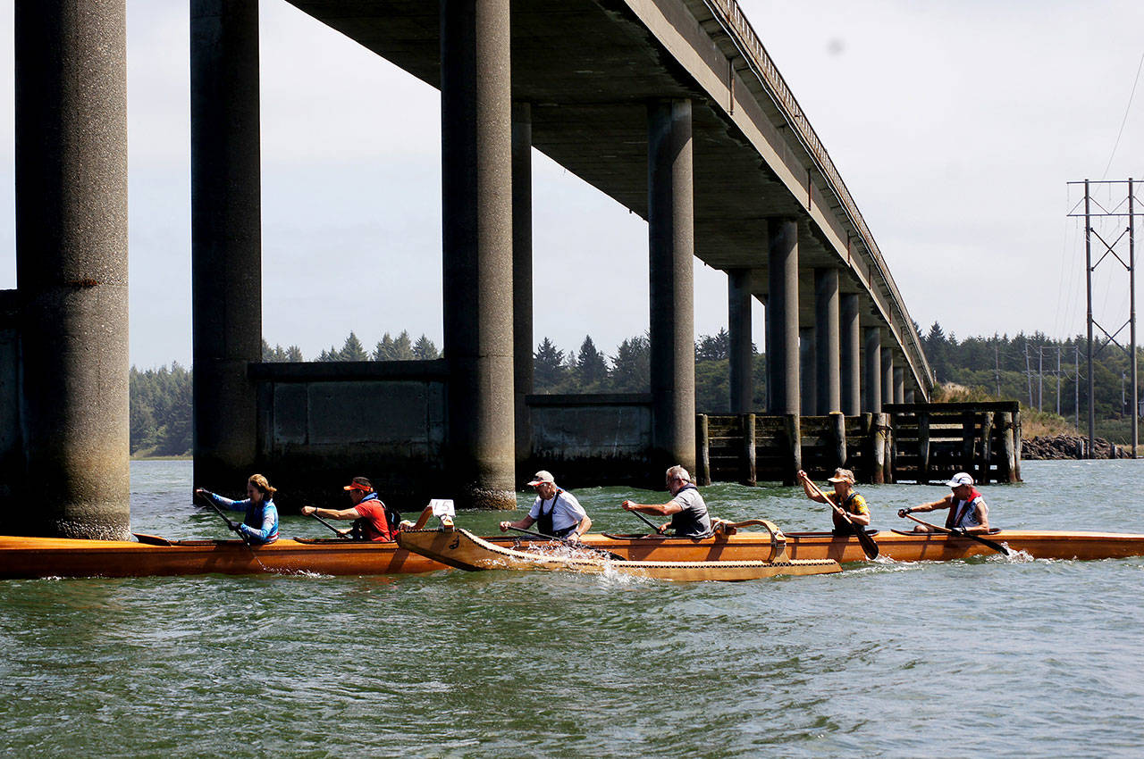 (Photo by Elk River Challenge Race Director Jon Harwood) Competitors in the 2016 Elk River Challenge battle it out under the Elk River Bridge near Brady’s Oysters.