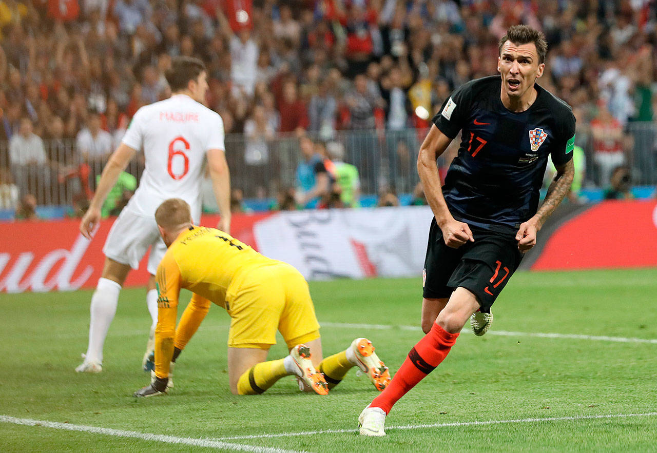 Croatia’s Mario Madzukic reacts after scoring the eventual game-winning goal in the second overtime of his team’s 2-1 World Cup semifinal victory over England on Wednesday in Moscow. (Cao Can | Xinhua)