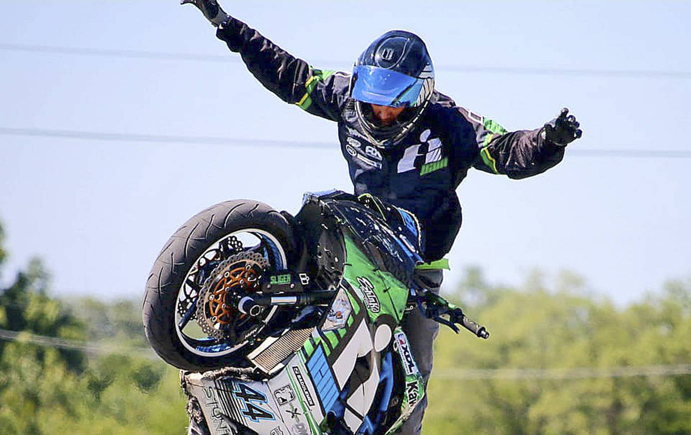 PHOTO COURTESY KYLE SLIGER                                Four motorcycle stunt teams will perform July 28 at the Bikers at the Beach rally in Ocean Shores, including Kyle Sliger, a stunt rider from Fort Wayne, Ind. Other performers include the Seattle Cossacks, the Tenino Motorcycle Drill Team and the all-Harley stunt team One Wheel Revolution.