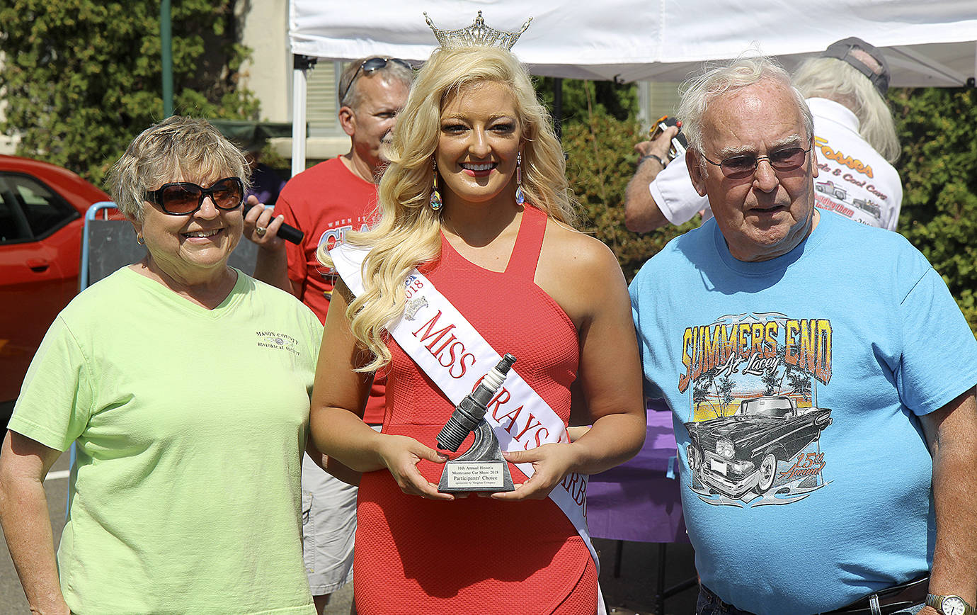 DAN HAMMOCK | THE DAILY WORLD                                Ray and Ann Kimbel of Shelton took home the participants’ choice award for their 1963 Mercury Comet at the Historic Montesano Car Show Saturday. Presenting all awards was Miss Grays Harbor Kuinn Karaffa.