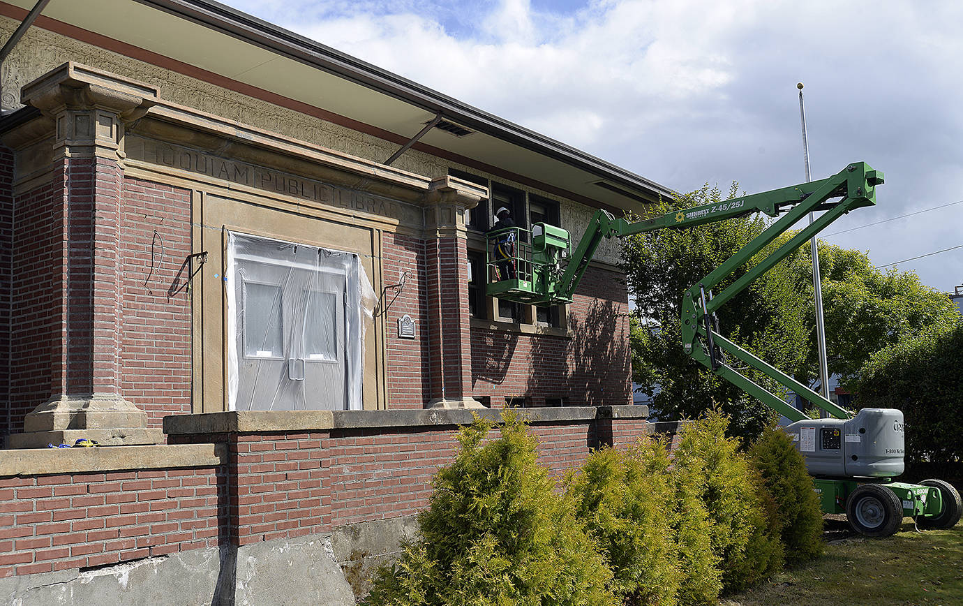 DAN HAMMOCK | THE DAILY WORLD                                 The K Street entrance to the Hoquiam Timberland Regional Library is getting a facelift, including new windows and ADA compliant doors.