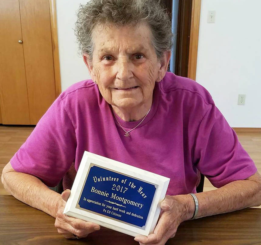 Bonnie Montgomery displays the Volunteer of the Year 2017 plaque awarded to her by the Town of Pe Ell in recognition of her tireless volunteer efforts in the community. (Kristi Milanowski | Twin Harbors Newspaper Group)