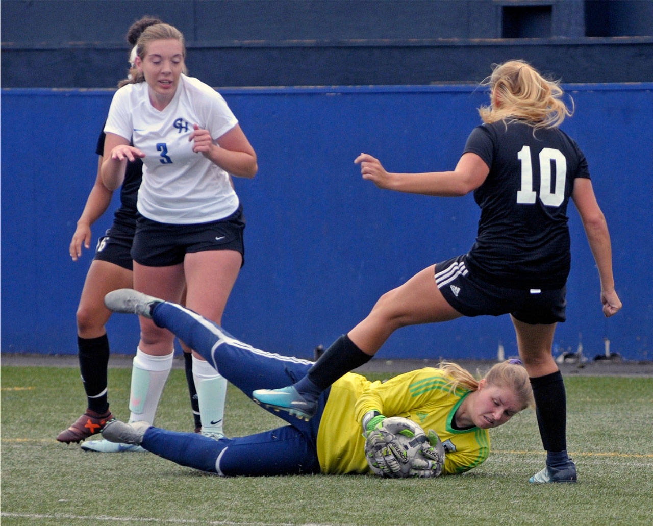 Grays Harbor goalkeeper Annalise Huntamer makes one of her 10 saves against Tacoma on Wednesday at Stewart Field. (Hasani Grayson | The Daily World)