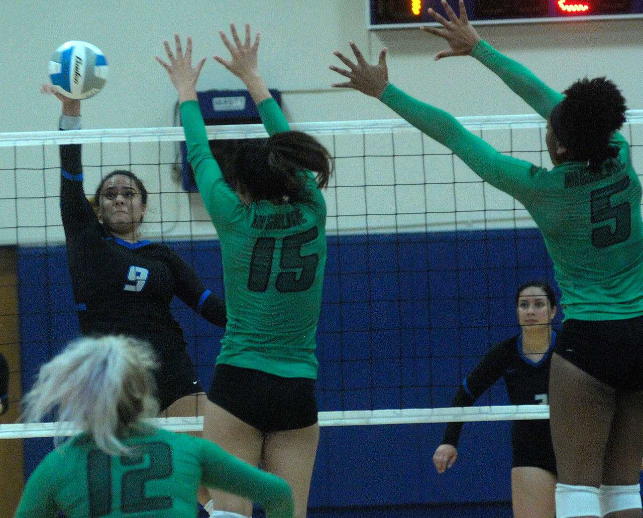 Grays Harbor Telia Kapihe gets her shot down the line against Highline College on Wednesday at Grays Harbor Gym. (Hasani Grayson | Grays Harbor News Group)