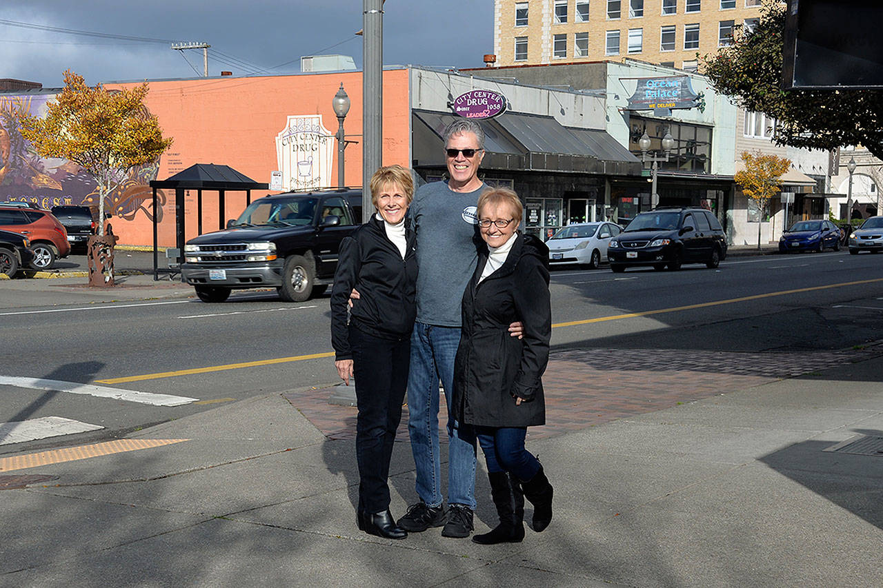 Louis Krauss | Grays Harbor News Group                                Aberdeen Revitalization Movement members Bette Worth, left, director Wil Russoul and Bobbi McCracken were recently informed that Aberdeen is now an official Main Street Community.