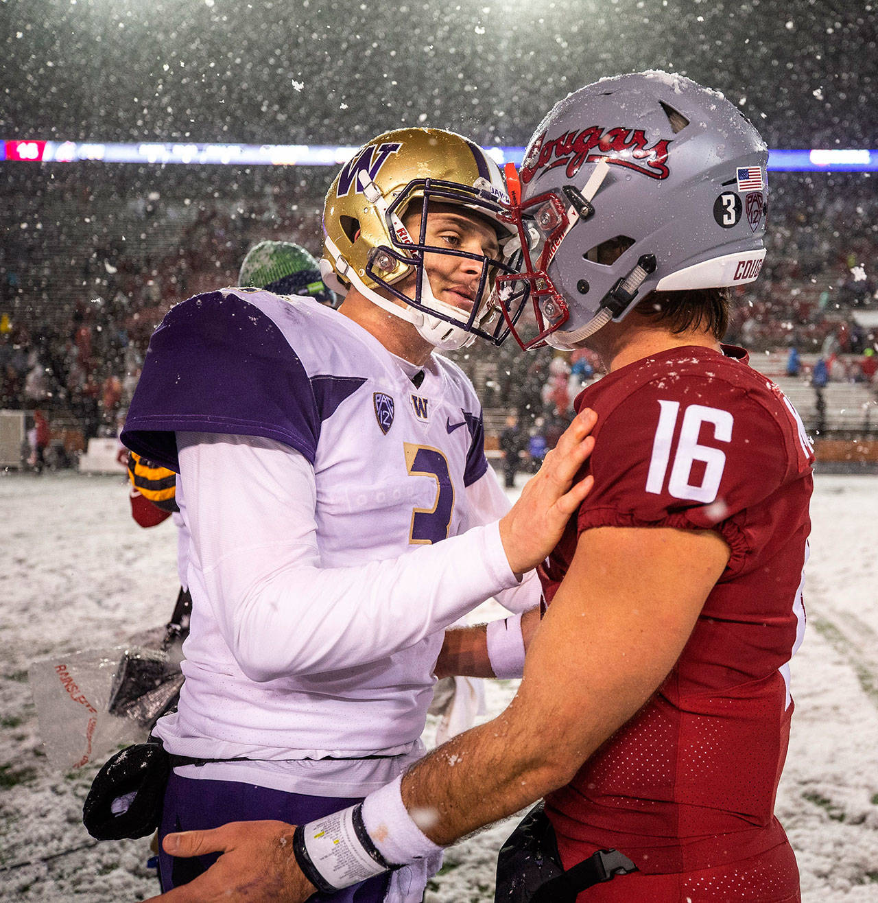 Washington’s Jake Browning and Washington State’s Gardner Minshew (16) meet after the game on November 23, 2018, at Martin Stadium in Pullman, Wash. Washington won, 28-15. (Dean Rutz/Seattle Times/TNS)