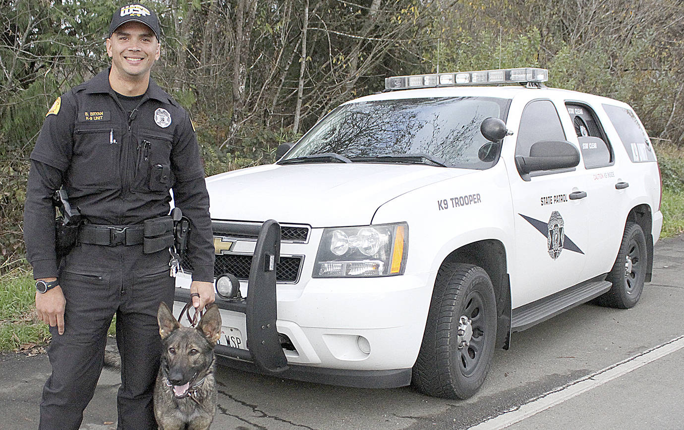 COURTESY PHOTO                                State Trooper Benjamin Bryan and his 1-year-old K9 officer Kyha, a German shepherd, have become the newest narcotics K9 team in the region.