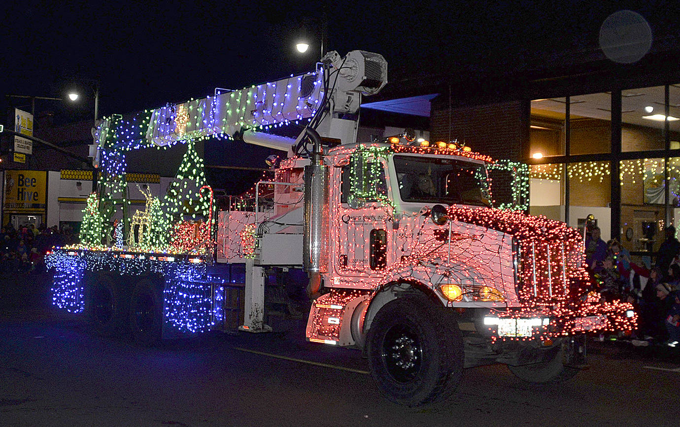 DAN HAMMOCK | GRAYS HARBOR NEWS GROUP                                The Quigg Bros. entry in the Montesano Festival of Lights parade took the sweepstakes award Saturday evening.