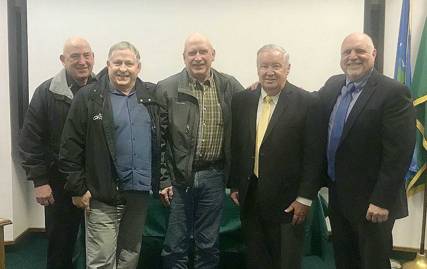 PHOTO COURTESY PORT OF GRAYS HARBOR                                From left, PUD commissioners Dave Timmons, Russ Skolrood and Arie Callaghan joined Port of Grays Harbor commissioners Stan Pinnick and Phil Papac for a joint special meeting Tuesday to learn about the potential benefits a transoceanic fiber optic cable landing could have on the region. Also discussed was a plan to increase the power capacity at the Satsop Business Park.