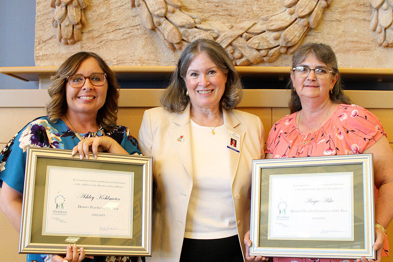 Courtesy Aberdeen School District                                Aberdeen High School teacher Ashley Kohlmeier, left, stands with Aberdeen Superintendent Alicia Henderson and bus driver Angie Ashe. Kohlmeier was awarded teacher of the year, while Ashe was awarded classified employee of the year for the Aberdeen School District.