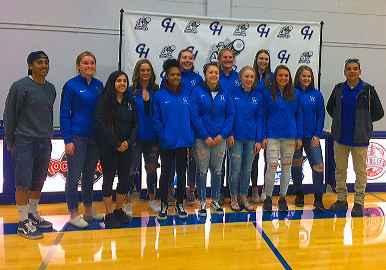 From left: Grays Harbor coach Irvin Vicente, Mercedes Denny, Coach Allie Oropeza, Tayler Housden, Mya Heard, Taylor Coker, Adriana Huerta, Kristi Raffelson, Piper Furford, Jenna Cross, Alexis Sapegin, Kiana Wright and coach Alan Carloza. Cross, Sapegin, Furfordmm, Housden and Wright all signed their letters of intent on Thursday at Grays Harbor College to join the team for the 2019 season.