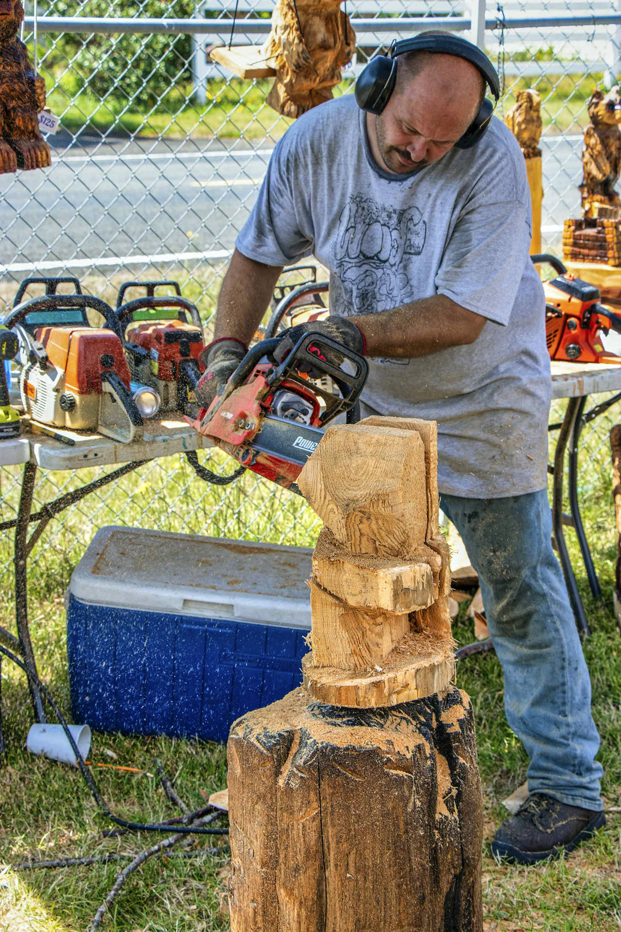 Kris L. Cox | For Grays Harbor News Group                                Hoquiam chainsaw artist Brandon Levesque shows off his technique during Woodfest in Tokeland.