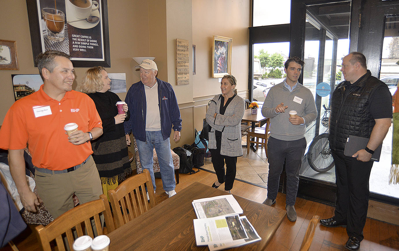 Photo by DAN HAMMOCK | GRAYS HARBOR NEWS GROUP                                Among the more than 40 people at a BHP meet-and-greet at the Jitter House in Hoquiam Wednesday morning were, from left, BHP Community Engagement Specialist Courage Bear; Hoquiam Mayor Jasmine Dickhoff; Port of Grays Harbor Commission President Stan Pinnick; Port of Grays Harbor Public Affairs Manager Kayla Dunlap; Public Affairs and Communications Director Austin Hicks; and Hoquiam City Councilman and mayoral candidate Ben Winkelman.