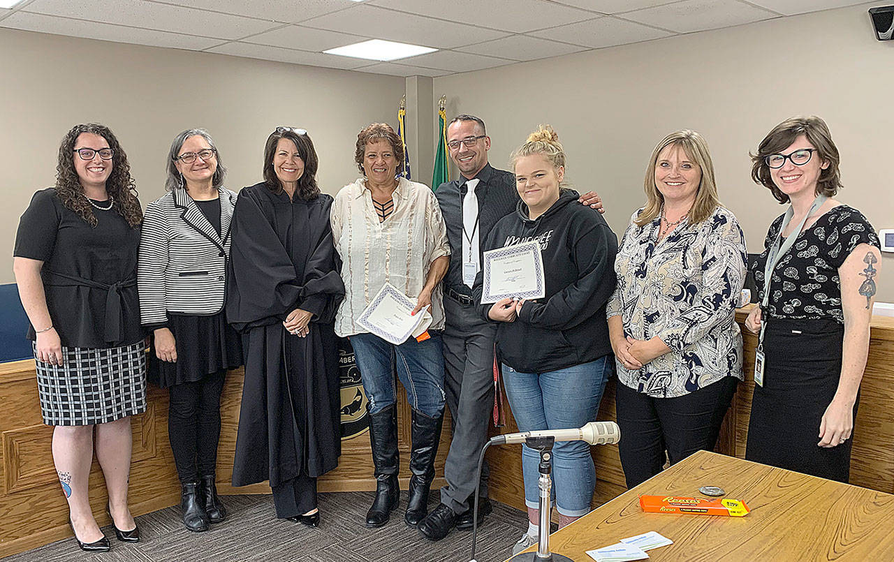 COURTESY PHOTO                                Aberdeen Community Court graduated its 100th participant Sept. 9. Pictured from left are Brittney Stephens, public defender; Patrice Kent, Aberdeen Corporation counsel; Judge Susan Solan; Angela Ping, graduate; Joey Bannish, lead judicial coordinator; Courtney McDougall, graduate; Tammy Sund, Court Administrator; and Lauren Garrett, judicial coordinator.