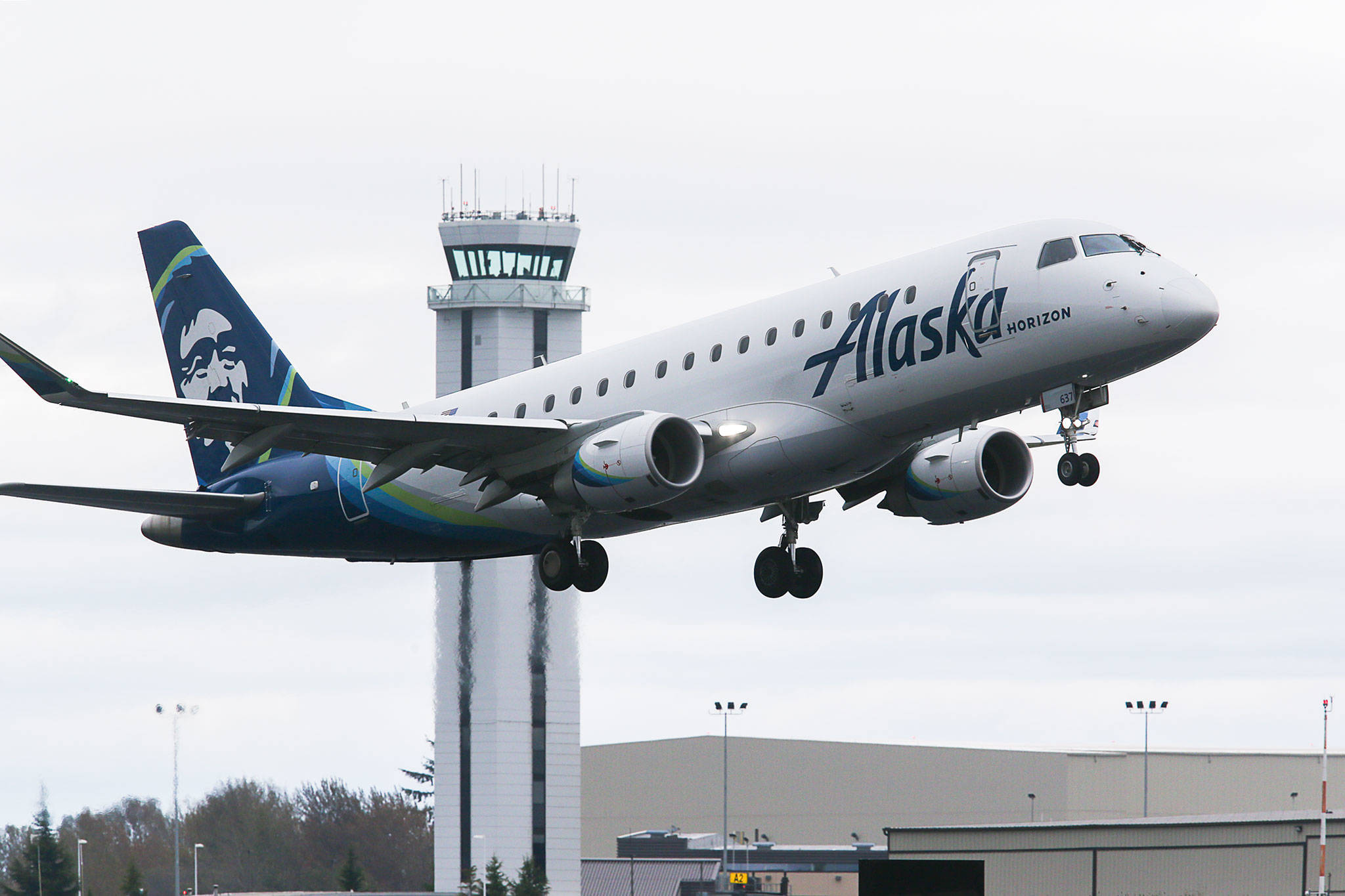 An Alaska Airlines plane takes off from Paine Field on Wednesday in Everett. (Andy Bronson / The Herald)