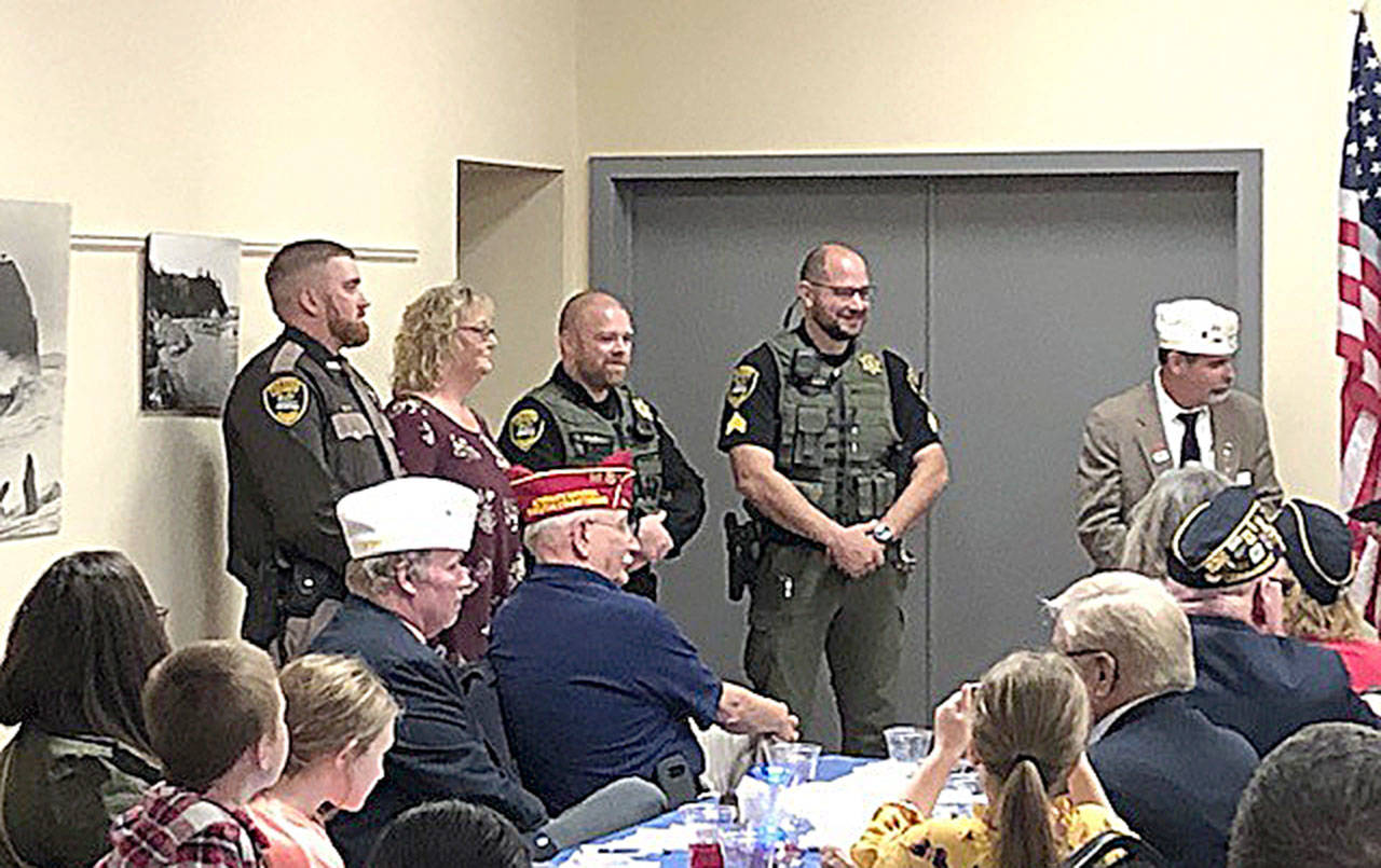 COURTESY PHOTO                                Officers from the Pacific County Sheriff’s Office were presented the American Legion Post 48 Derald Robertson Safety Award Oct. 23. Pictured are Deputy Ben Woodby, Susan Moten, Deputy Tony Kimball and Sgt. Jon Ashley. Moten is the mother of honoree Deputy Ryley Queener, who was unable to attend.