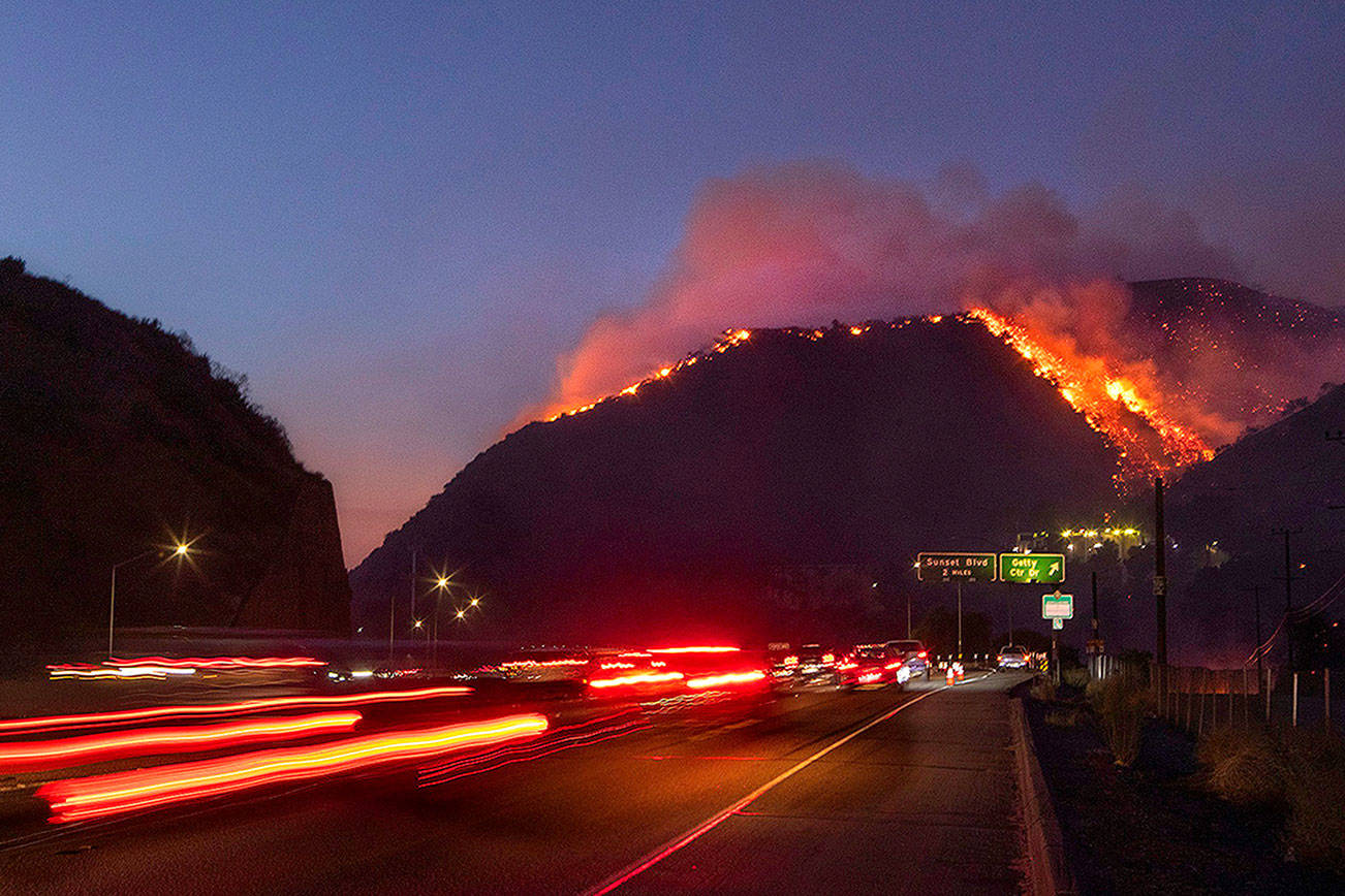 Los Angeles threatened as wildfires continue to roar