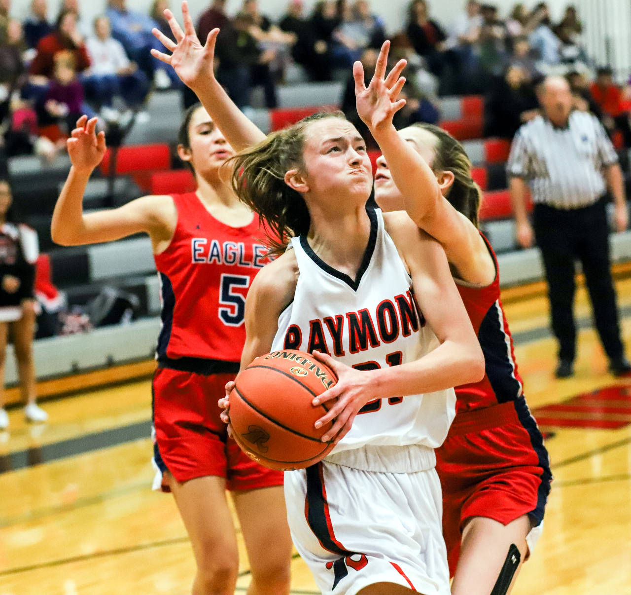 Raymond’s Kyra Gardner drives to the basket against Life Christian Academy on Thursday in Raymond. Gardner recorded a triple-double with 25 points, 11 rebounds and 10 steals. (Photo by Larry Bale)