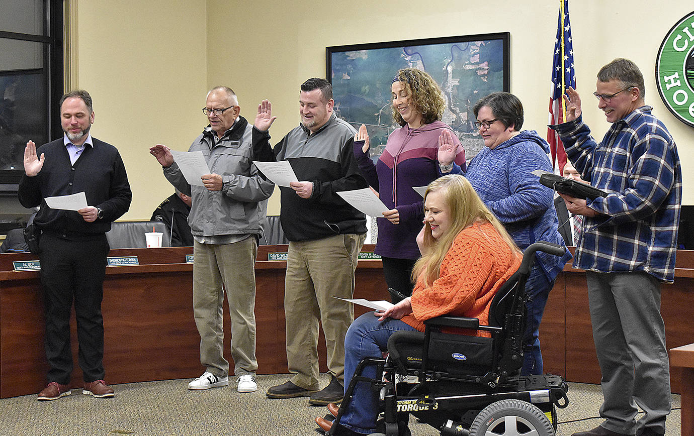 DAN HAMMOCK | GRAYS HARBOR NEWS GROUP                                Re-elected and newly-elected Hoquiam City Council members were sworn in prior to Monday’s council meeting. From left: Steven Puvogel, Ward 2; new Ward 4 Councilman Al Dick; Dave Hinchen, Ward 6; Shannon Patterson, Ward 3; Brenda Carlstrom, Ward 5; Elizabeth Reid, Ward 6; and Dave Wilson, Ward 1.