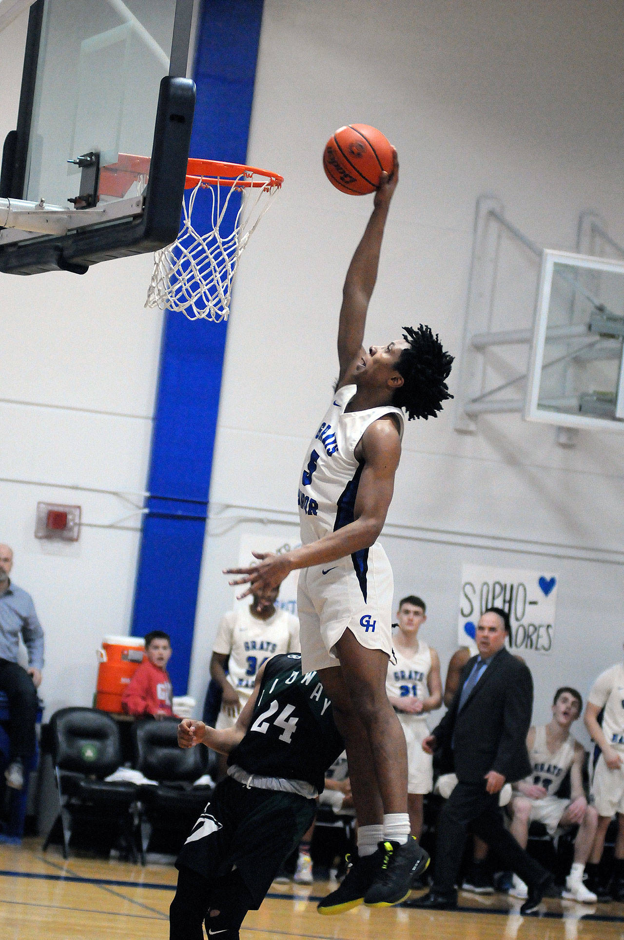 Grays Harbor sophomore Michael Sampson dunks for two of his game-high 25 points in the Chokers’ 91-74 victory over Highline on Wednesday in Aberdeen. The victory secured Grays Harbor’s first spot in the NWAC Tournament in 12 years. (Ryan Sparks | Grays Harbor News Group)