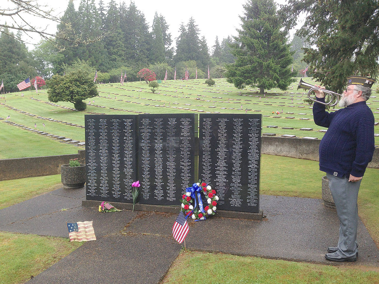 Rob Hoeffer, retired from the U.S. Air Force, presented taps on the electronic bugle. (courtesy photo)