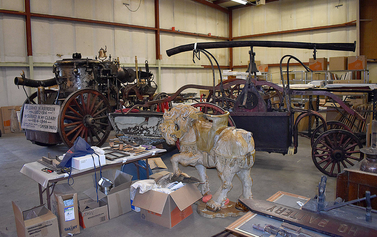 DAN HAMMOCK | THE DAILY WORLD 
The Aberdeen City Council has approved the hiring of a full-time employee to catalog and manage the collection of the Aberdeen Museum of History. Items large and small, some recovered from the fire and others previously housed in an annex building, are currently stored in a warehouse on Port Industrial Road.